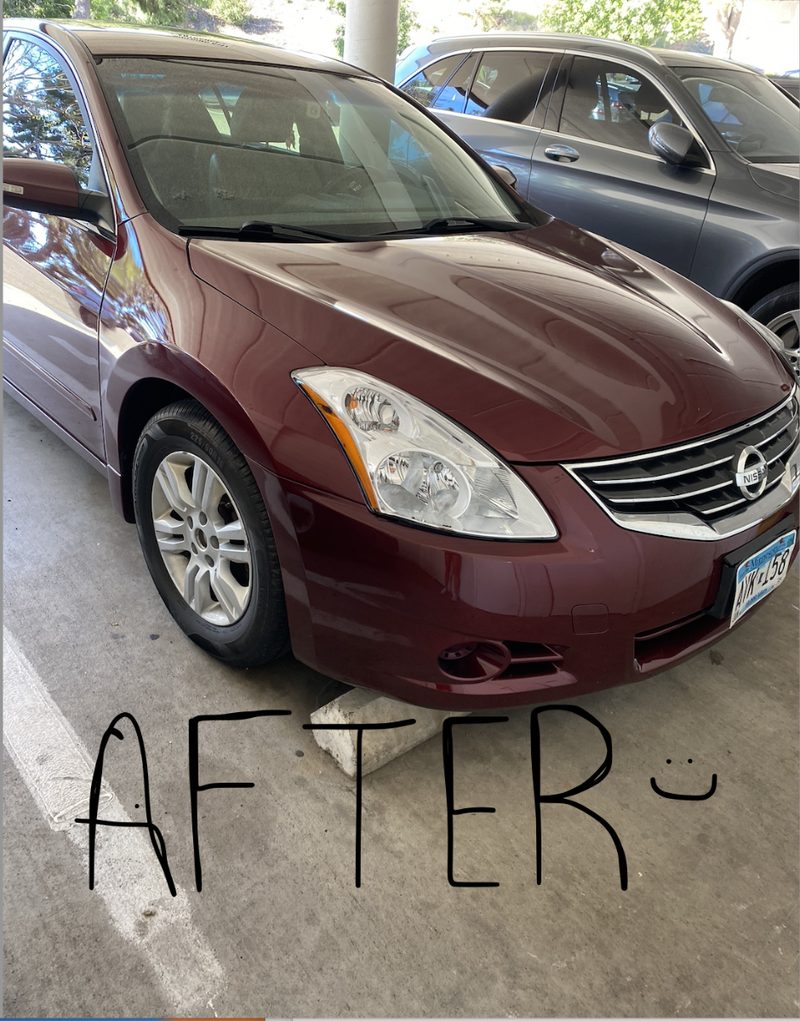 The same maroon Nissan Altima after repair